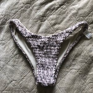 Selling a size S Alfi Lahana swim co brand bottom